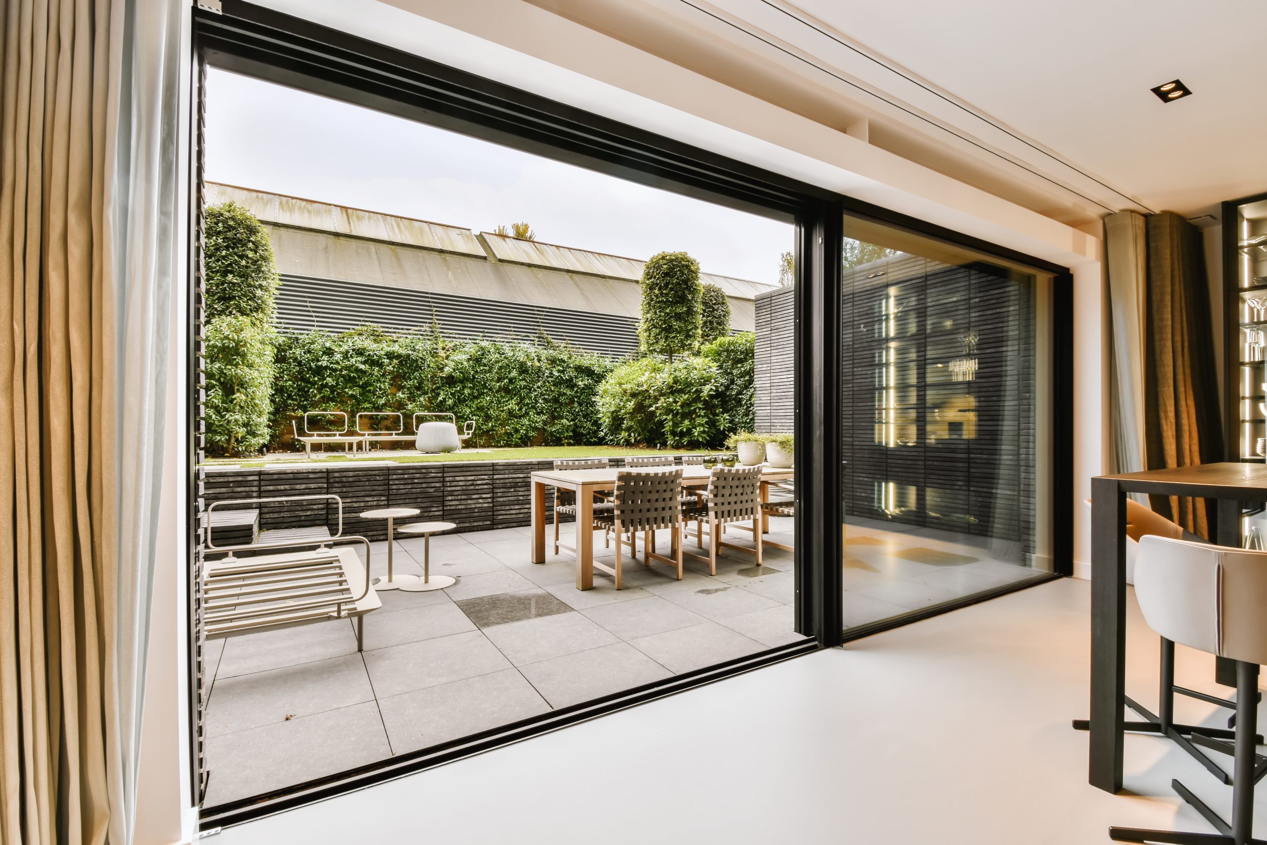 Luxury curtains for glass sliding doors with modern track.