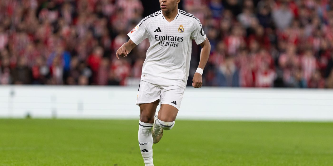 Bilbao, Spain - December 4, 2024: League match between Athletic Bilbao and Real Madrid played in Bilbao. Kylian Mbappe in a white shirt during the match. European Champions.